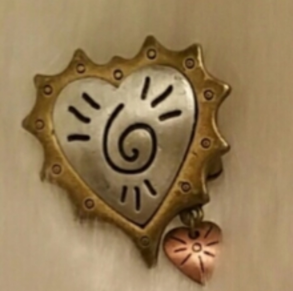 Unique heart pin.